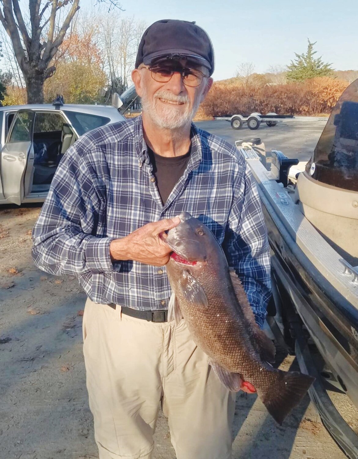 TAUTOG BITE: Walt Galloway with tautog. He and his fishing partner Walter Berry caught tautog to 21 inches earlier this week in the General Rock, North Kingstown area. (Submitted photo)